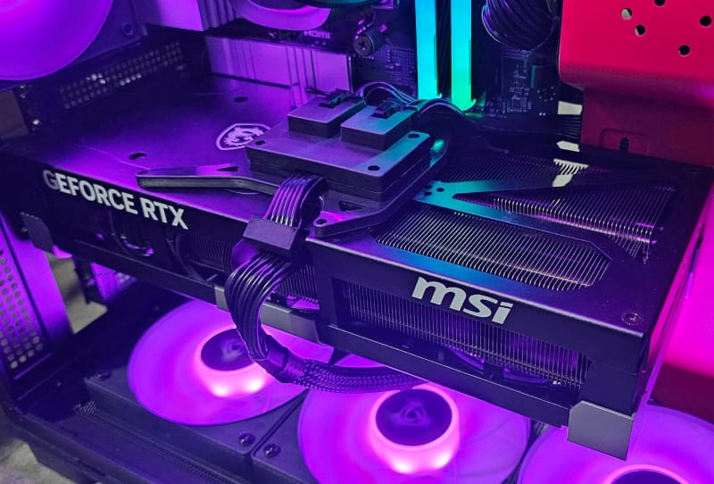 MSI GeForce RTX 5090 graphics card with a modified RTX 5090 power connector featuring two extra 8-pin PCIe sockets