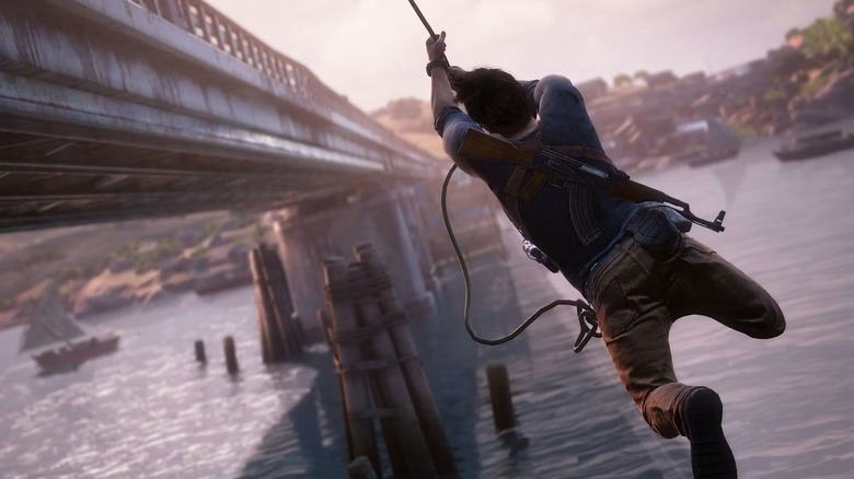 Nathan Drake leng egy hídról az Uncharted 4: A Thief's Endben