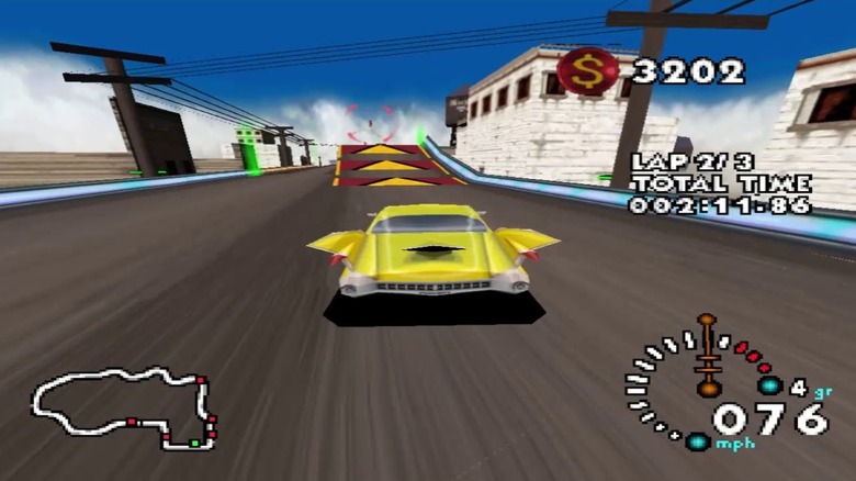 Egy uszonyos autó közeledik a Stunt Racer 64 rámpa felé