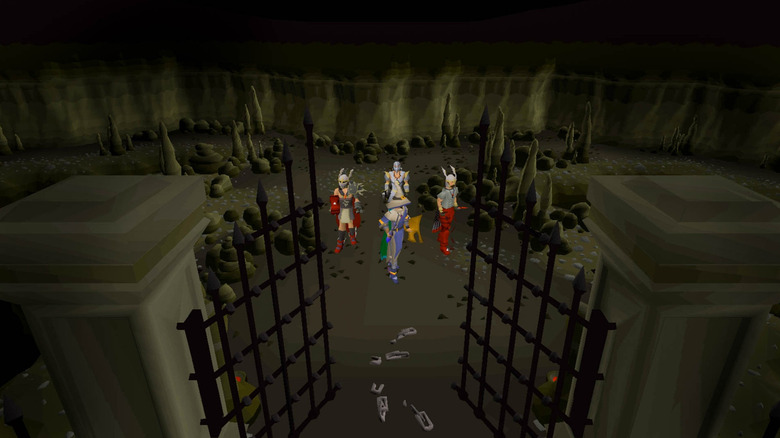 Négy Old School RuneScape játékos egy börtön közepén áll