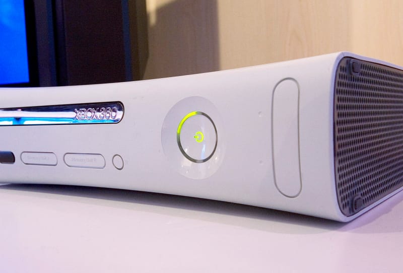 Open Xbox 360 console motherboard with a Raspberry Pi Pico wired up for an Xbox 360 voltage glitch mod