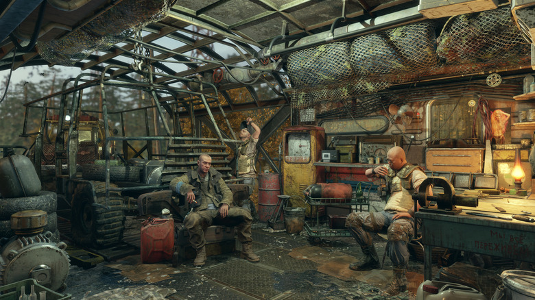 Metro Exodus NPC-k ülnek egy rozsdás acél búvóhely körül