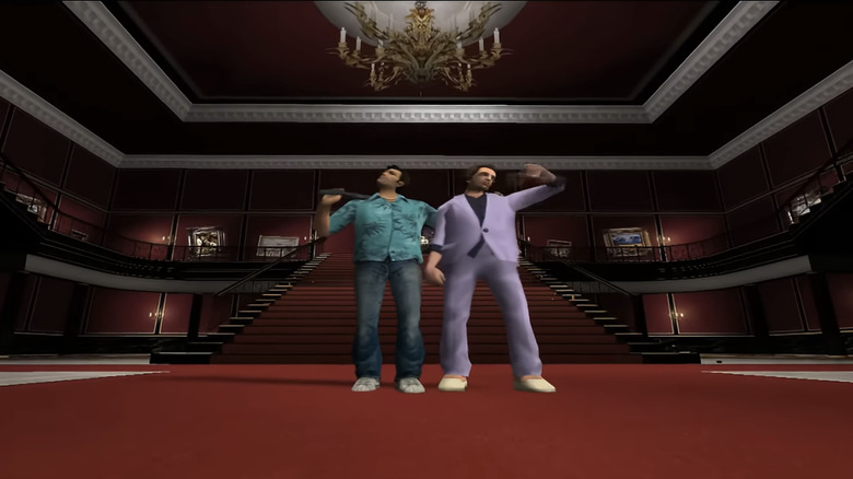 Tommy Vercetti és Ken Rosenberg egymás mellett állnak a Grand Theft Auto Vice Cityben található Vercetti-kastély előcsarnokában.