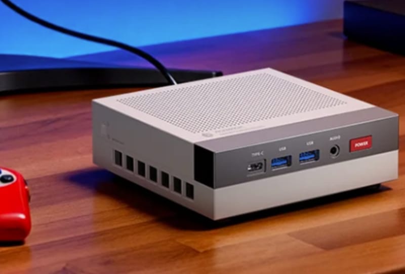 Acemagic Retro X3 mini PC in grey NES-inspired casing sitting on a desk