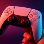 PS5 home screen mockup showing a dedicated PS5 Crunchyroll hub icon among other app shortcuts