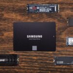A PCIe Gen 5 NVMe SSD with a metal heatsink installed on a gaming motherboard