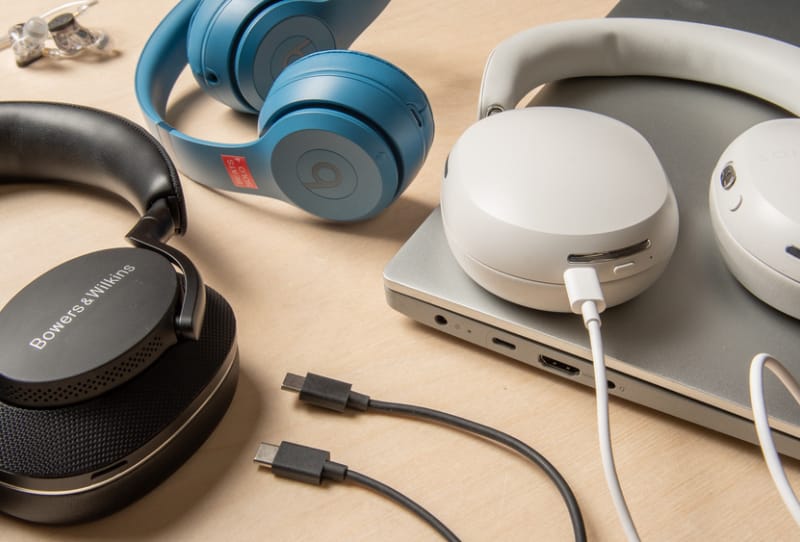 A pair of USB-C headphones plugged into an Android smartphone